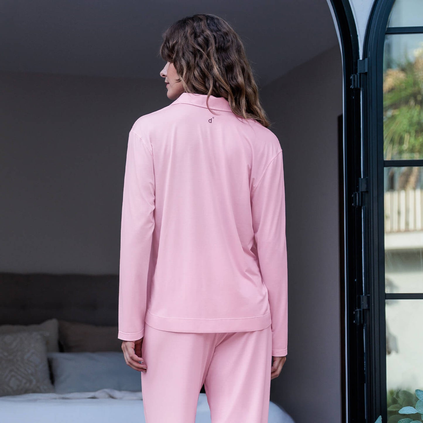 Woman wearing a pink pajama set || Wild rose