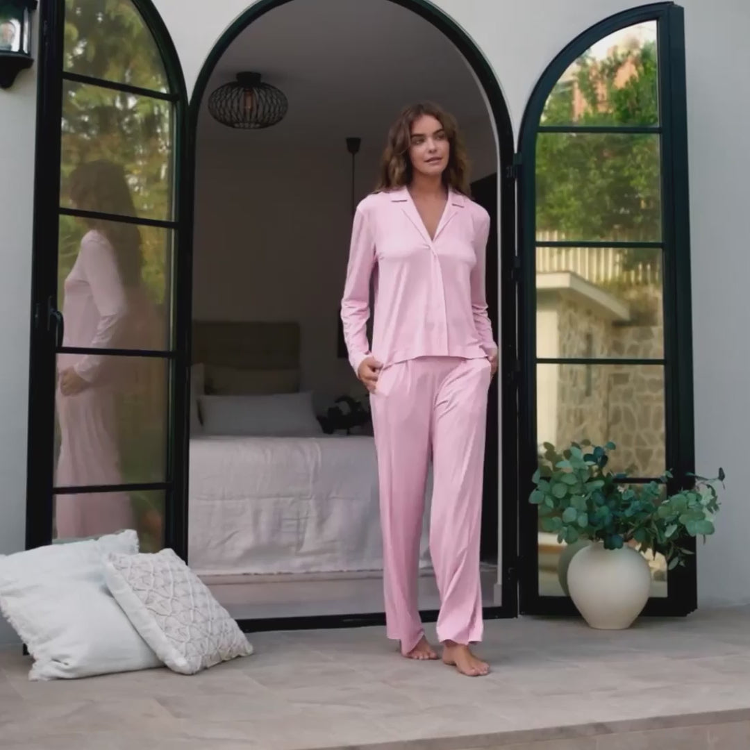 Woman wearing a pink pajama set || Wild rose